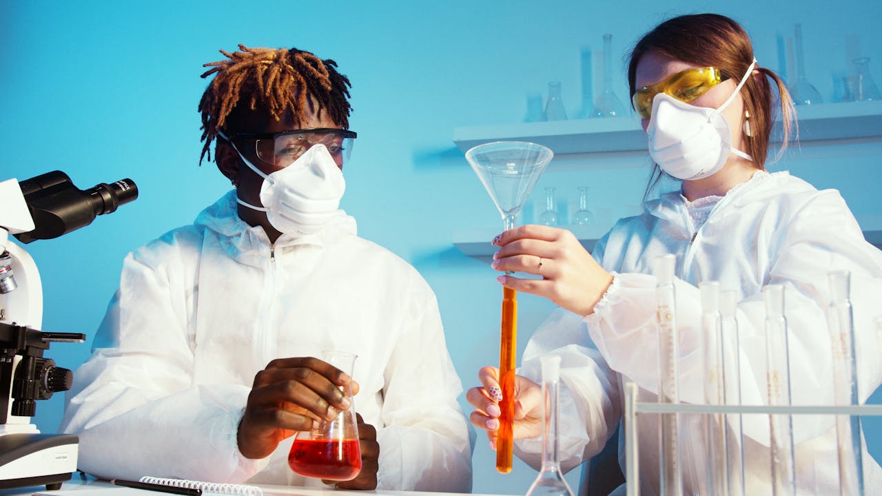 A Man and a Woman Doing an Experiment